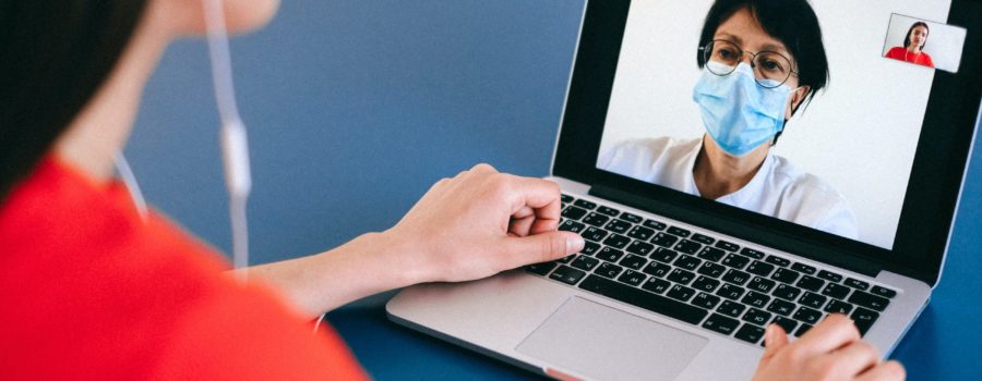 someone speaking with a healthcare practitioner via zoom call to make a perscription